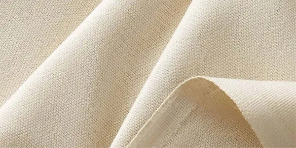 Natural woven cotton canvas fabric close-up