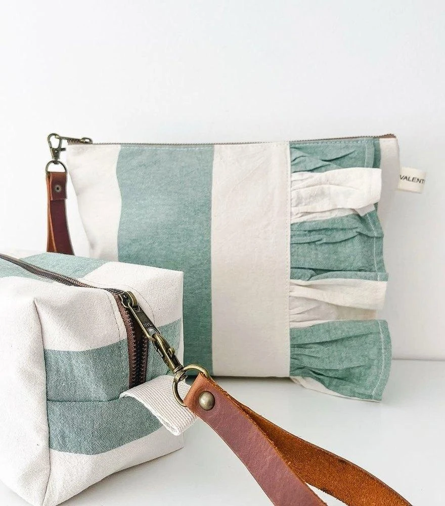 Striped canvas zip pouches made from ReWeav recycled woven fabric